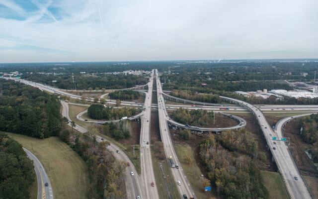 Aerial view of a highway interchange and its access roads