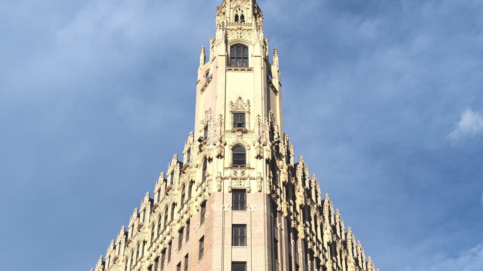 Historic Gothic tower flying the Texas flag in downtown San Antonio