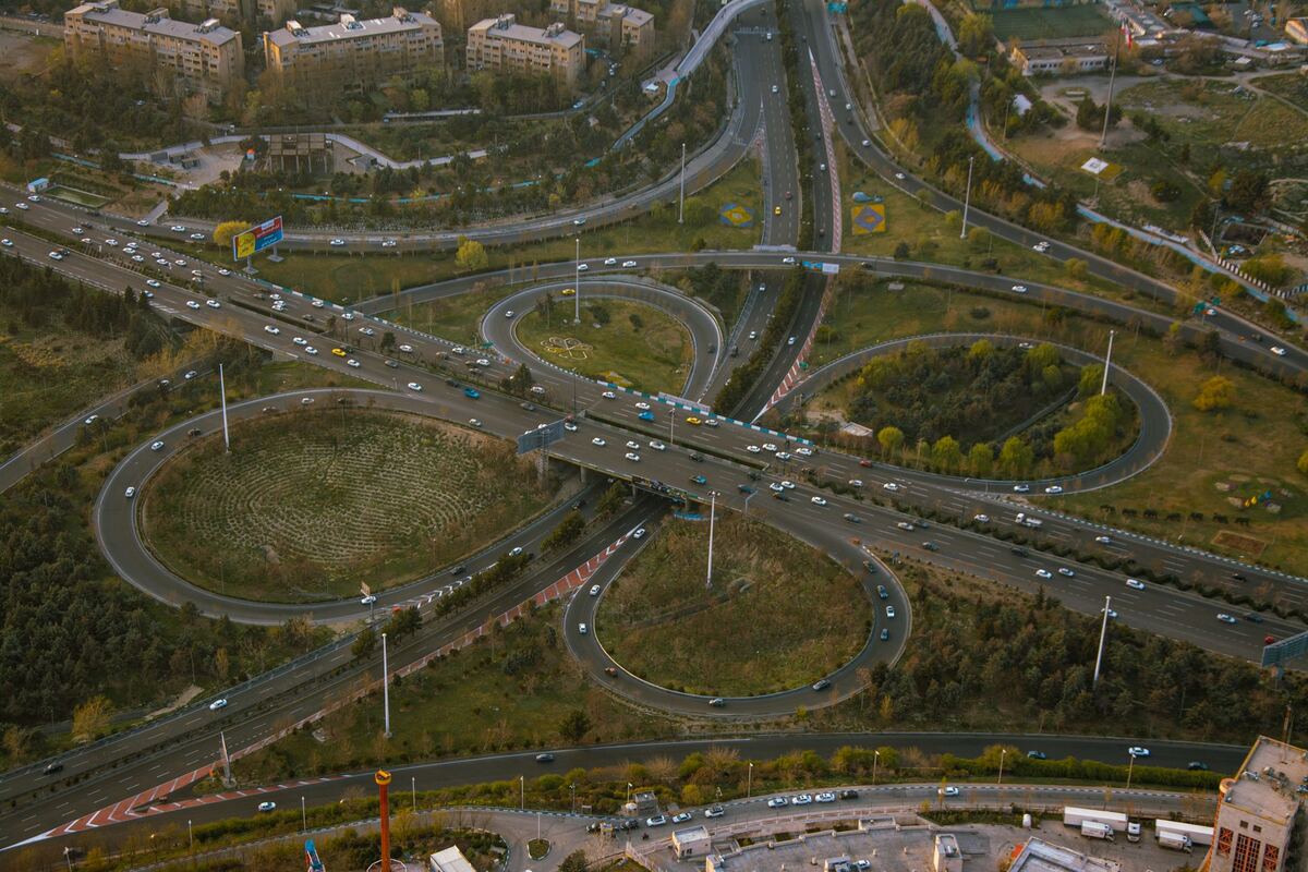 Aerial view of a highway interchange with looping ramps